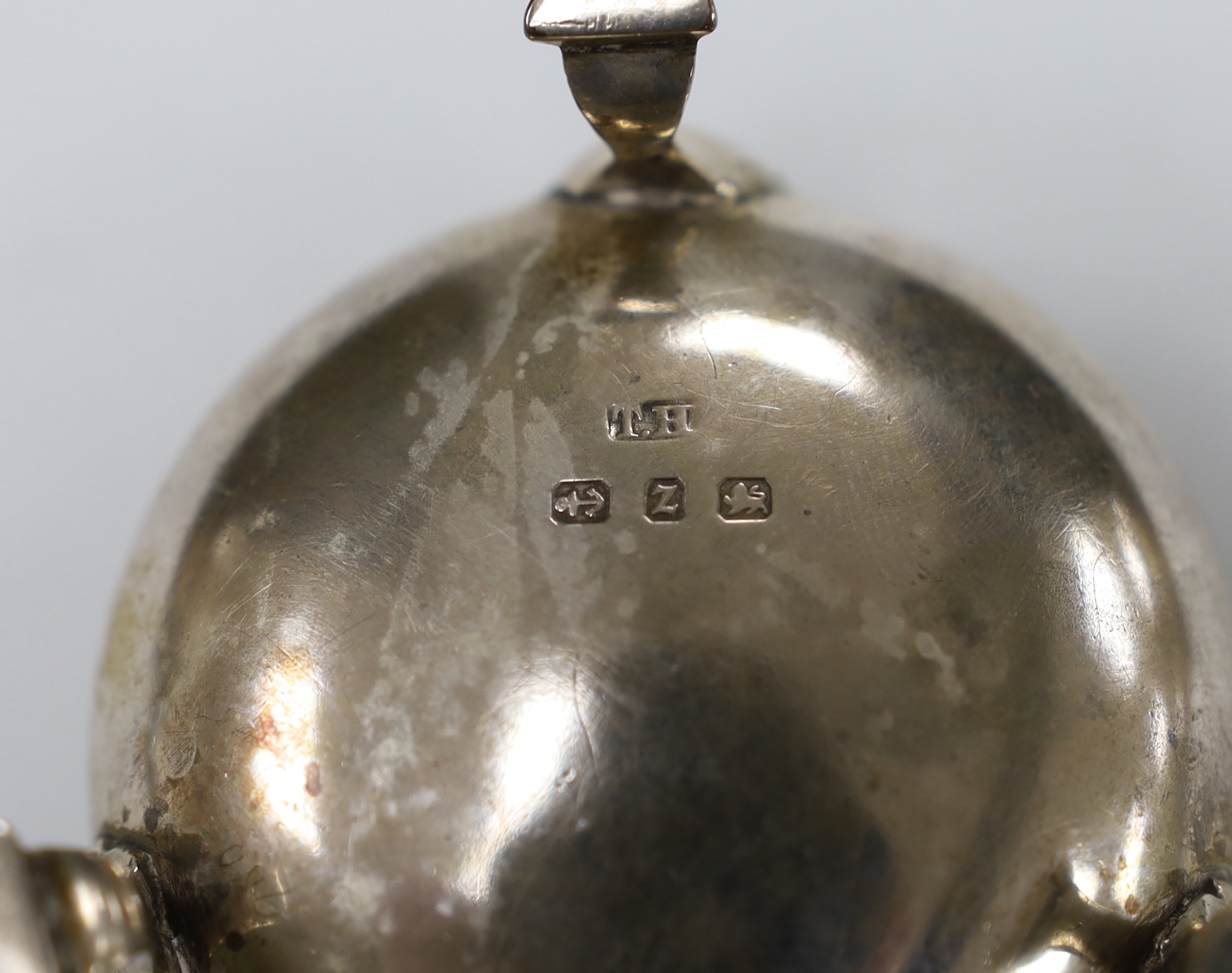 A George V silver baluster sugar caster, E.S. Barnsley & Co, Birmingham, 1910, 13.9cm, a silver salt and a sterling condiment, 5.5oz.